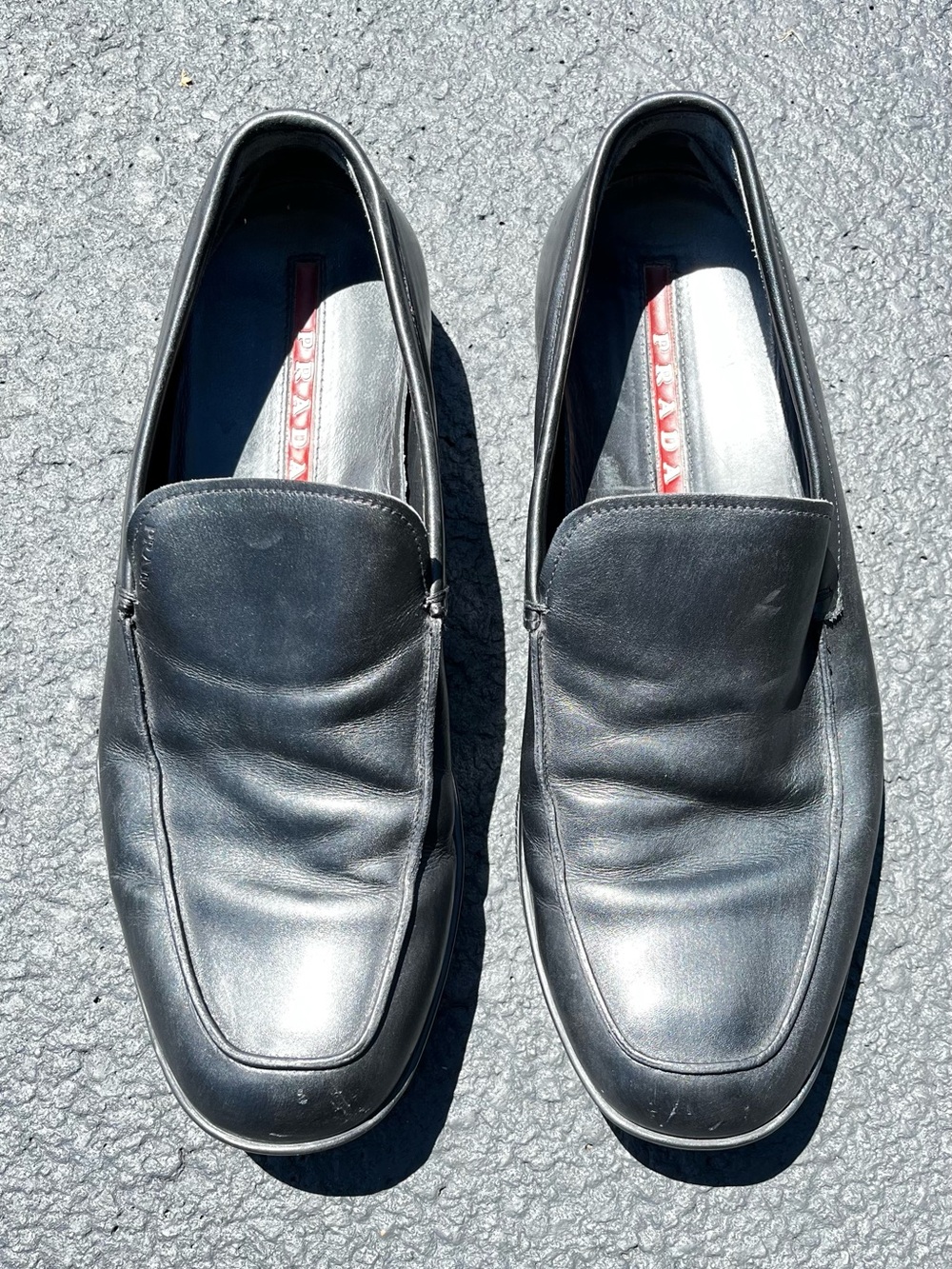 Prada Linea Rossa black leather loafers classic slip-on design Round Toes 7.5M
